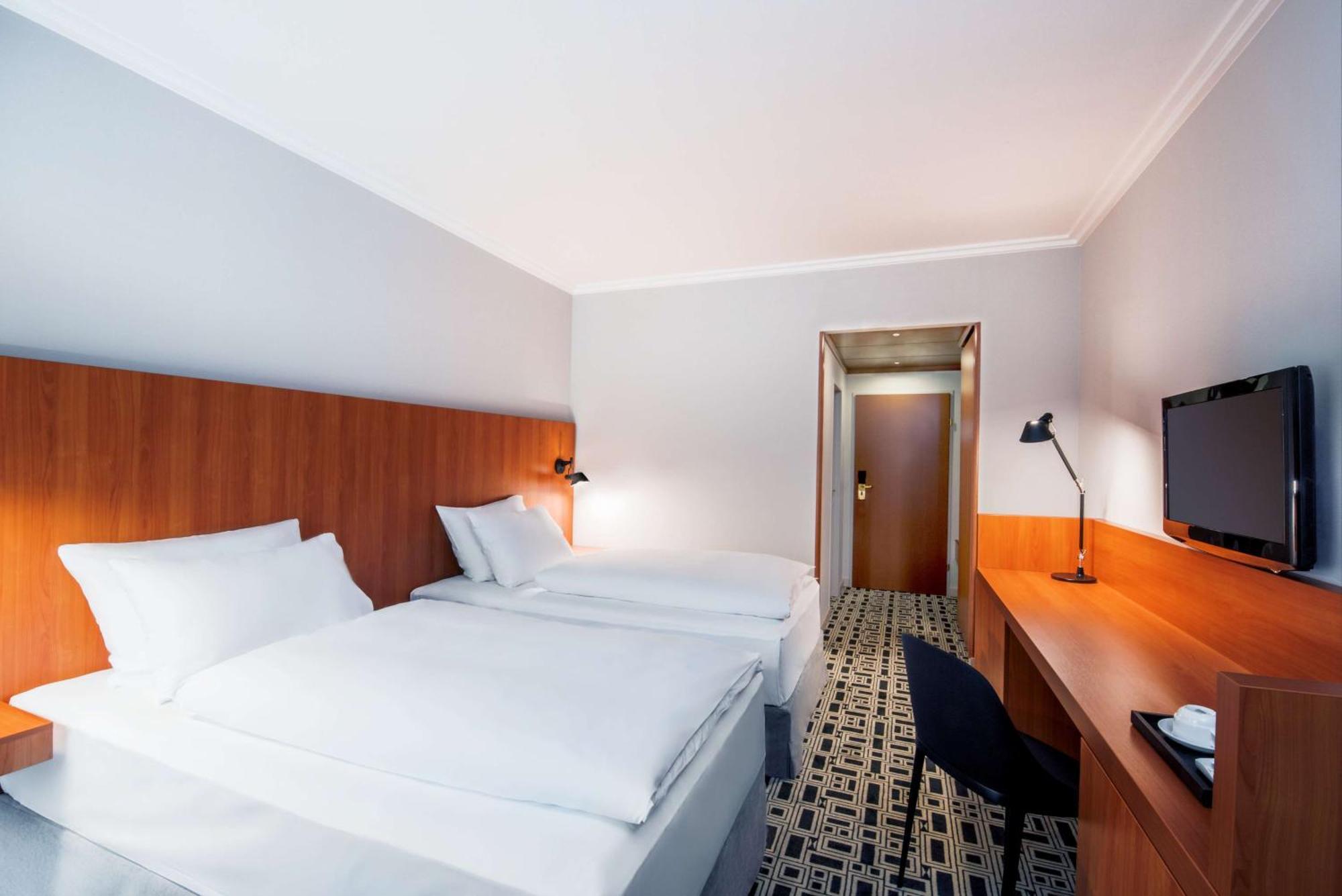 Habitación Doble Estándar con cama supletoria - 1 o 2 camas